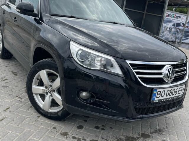 Черный Фольксваген Тигуан, объемом двигателя 2 л и пробегом 209 тыс. км за 12500 $, фото 1 на Automoto.ua