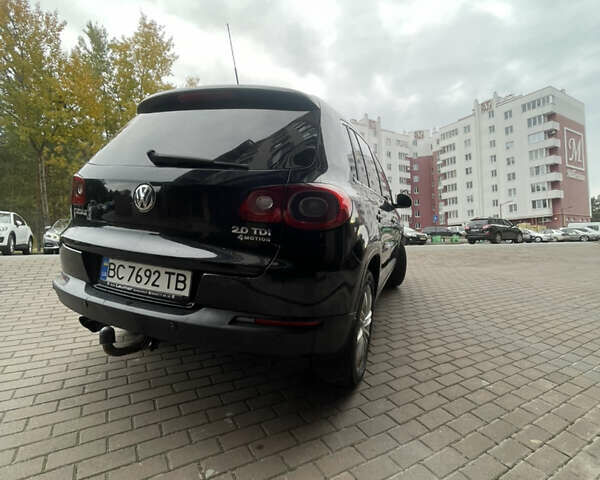 Черный Фольксваген Тигуан, объемом двигателя 2 л и пробегом 317 тыс. км за 10900 $, фото 8 на Automoto.ua