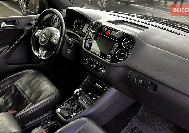 Черный Фольксваген Тигуан, объемом двигателя 2 л и пробегом 225 тыс. км за 9400 $, фото 9 на Automoto.ua