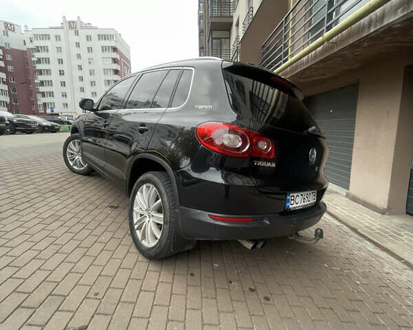 Черный Фольксваген Тигуан, объемом двигателя 2 л и пробегом 317 тыс. км за 10900 $, фото 11 на Automoto.ua