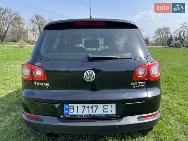 Чорний Фольксваген Тігуан, об'ємом двигуна 2 л та пробігом 260 тис. км за 13000 $, фото 2 на Automoto.ua