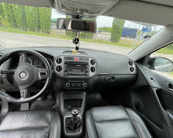 Черный Фольксваген Тигуан, объемом двигателя 1.97 л и пробегом 209 тыс. км за 12500 $, фото 14 на Automoto.ua