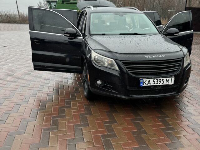 Черный Фольксваген Тигуан, объемом двигателя 2 л и пробегом 285 тыс. км за 13400 $, фото 7 на Automoto.ua