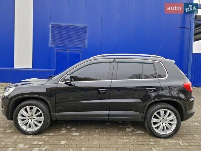 Черный Фольксваген Тигуан, объемом двигателя 2 л и пробегом 195 тыс. км за 13650 $, фото 4 на Automoto.ua