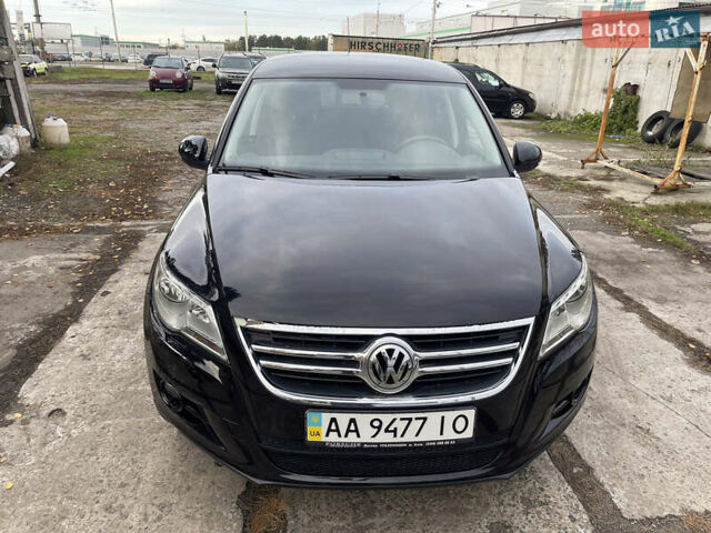 Чорний Фольксваген Тігуан, об'ємом двигуна 2 л та пробігом 157 тис. км за 9300 $, фото 2 на Automoto.ua