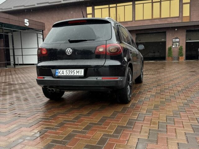 Черный Фольксваген Тигуан, объемом двигателя 2 л и пробегом 285 тыс. км за 13400 $, фото 2 на Automoto.ua