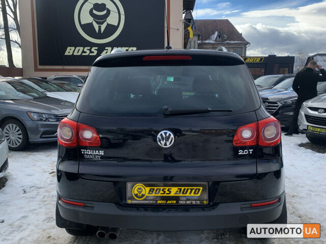 Черный Фольксваген Тигуан, объемом двигателя 2 л и пробегом 253 тыс. км за 10500 $, фото 4 на Automoto.ua