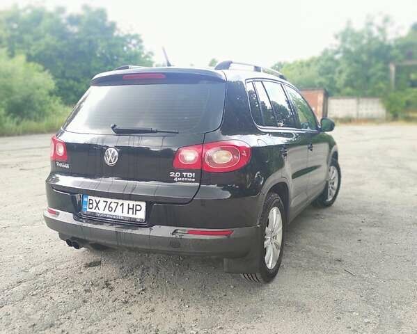 Черный Фольксваген Тигуан, объемом двигателя 2 л и пробегом 269 тыс. км за 12300 $, фото 4 на Automoto.ua