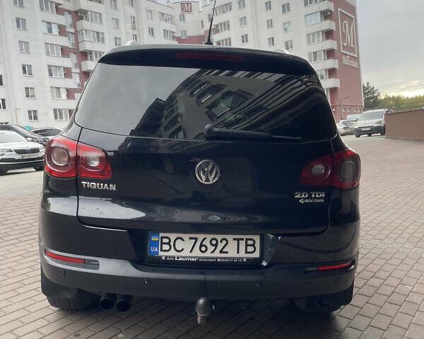 Черный Фольксваген Тигуан, объемом двигателя 2 л и пробегом 317 тыс. км за 10900 $, фото 9 на Automoto.ua