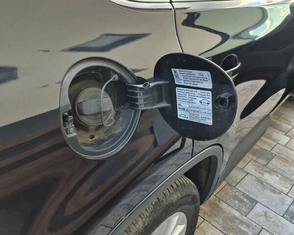 Чорний Фольксваген Тігуан, об'ємом двигуна 2 л та пробігом 218 тис. км за 9300 $, фото 4 на Automoto.ua