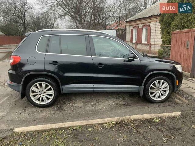 Чорний Фольксваген Тігуан, об'ємом двигуна 2 л та пробігом 199 тис. км за 10700 $, фото 3 на Automoto.ua