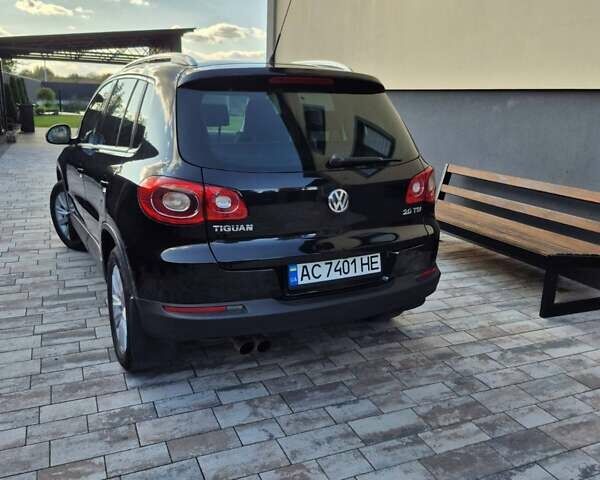 Чорний Фольксваген Тігуан, об'ємом двигуна 2 л та пробігом 218 тис. км за 9300 $, фото 7 на Automoto.ua