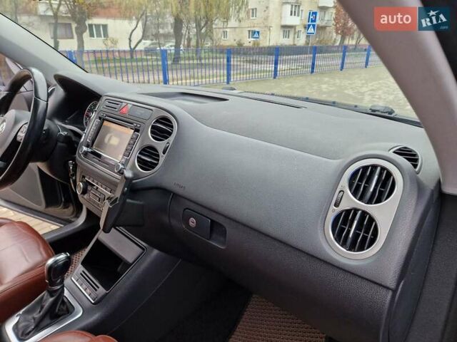 Черный Фольксваген Тигуан, объемом двигателя 2 л и пробегом 195 тыс. км за 13650 $, фото 38 на Automoto.ua