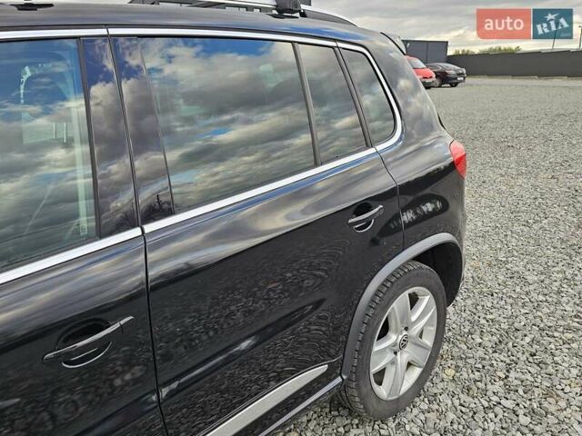 Черный Фольксваген Тигуан, объемом двигателя 0 л и пробегом 156 тыс. км за 14800 $, фото 2 на Automoto.ua