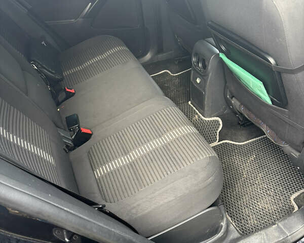 Черный Фольксваген Тигуан, объемом двигателя 1.39 л и пробегом 204 тыс. км за 9700 $, фото 5 на Automoto.ua