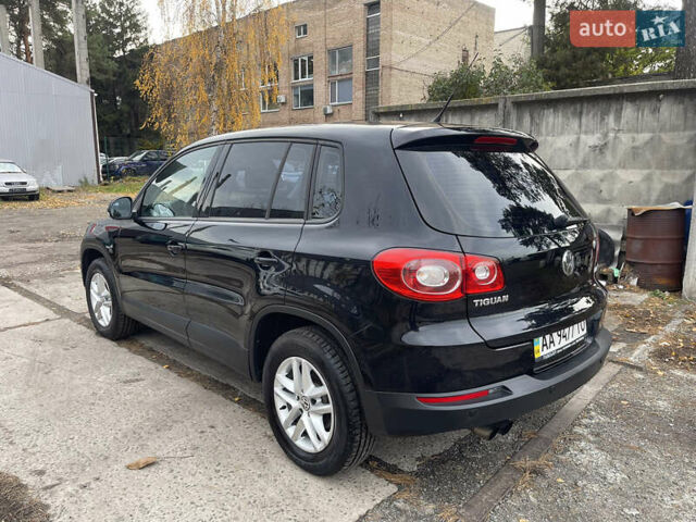 Чорний Фольксваген Тігуан, об'ємом двигуна 2 л та пробігом 157 тис. км за 9300 $, фото 4 на Automoto.ua
