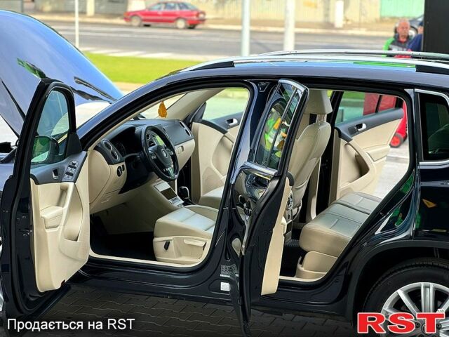 Черный Фольксваген Тигуан, объемом двигателя 2 л и пробегом 283 тыс. км за 9500 $, фото 5 на Automoto.ua