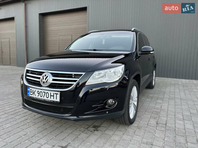 Черный Фольксваген Тигуан, объемом двигателя 1.97 л и пробегом 265 тыс. км за 12300 $, фото 1 на Automoto.ua