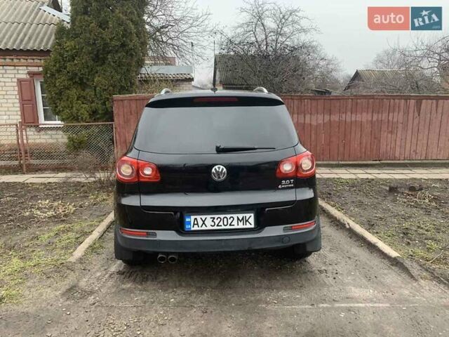Чорний Фольксваген Тігуан, об'ємом двигуна 2 л та пробігом 199 тис. км за 10700 $, фото 9 на Automoto.ua