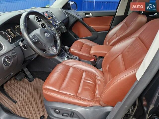 Черный Фольксваген Тигуан, объемом двигателя 2 л и пробегом 195 тыс. км за 13650 $, фото 20 на Automoto.ua