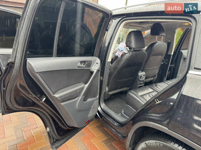 Чорний Фольксваген Тігуан, об'ємом двигуна 2 л та пробігом 285 тис. км за 13500 $, фото 8 на Automoto.ua