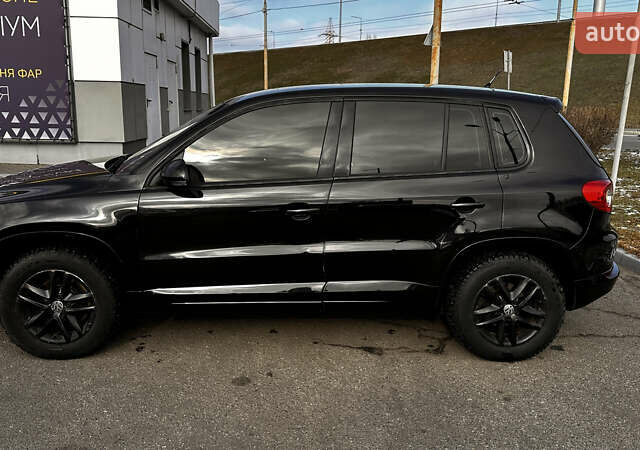 Черный Фольксваген Тигуан, объемом двигателя 2 л и пробегом 225 тыс. км за 9400 $, фото 20 на Automoto.ua
