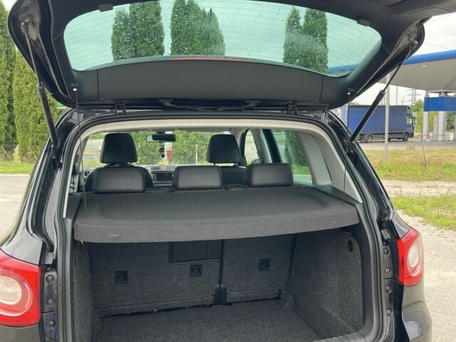 Черный Фольксваген Тигуан, объемом двигателя 2 л и пробегом 209 тыс. км за 12500 $, фото 4 на Automoto.ua