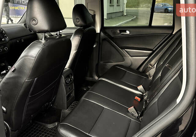 Черный Фольксваген Тигуан, объемом двигателя 2 л и пробегом 225 тыс. км за 9400 $, фото 8 на Automoto.ua