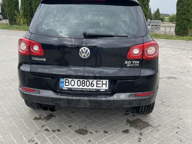 Черный Фольксваген Тигуан, объемом двигателя 2 л и пробегом 209 тыс. км за 12500 $, фото 6 на Automoto.ua