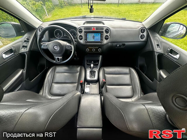 Чорний Фольксваген Тігуан, об'ємом двигуна 2 л та пробігом 309 тис. км за 8700 $, фото 7 на Automoto.ua