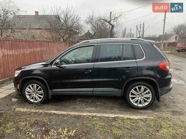 Чорний Фольксваген Тігуан, об'ємом двигуна 2 л та пробігом 199 тис. км за 10700 $, фото 5 на Automoto.ua