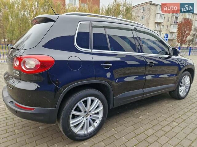 Черный Фольксваген Тигуан, объемом двигателя 2 л и пробегом 195 тыс. км за 13300 $, фото 12 на Automoto.ua