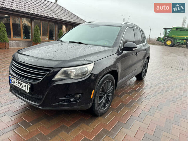Чорний Фольксваген Тігуан, об'ємом двигуна 2 л та пробігом 285 тис. км за 13500 $, фото 2 на Automoto.ua