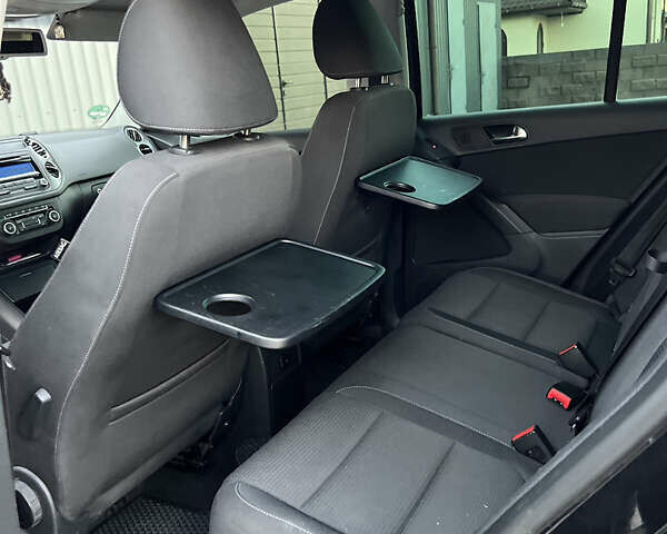 Черный Фольксваген Тигуан, объемом двигателя 1.97 л и пробегом 265 тыс. км за 12300 $, фото 26 на Automoto.ua