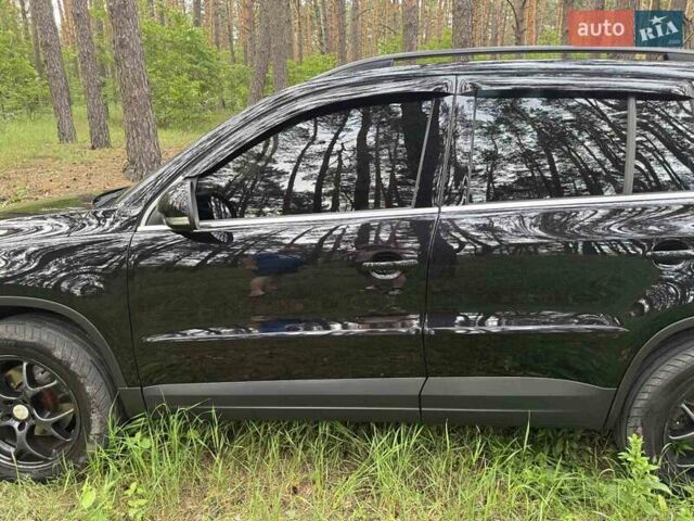 Черный Фольксваген Тигуан, объемом двигателя 1.97 л и пробегом 210 тыс. км за 11500 $, фото 1 на Automoto.ua