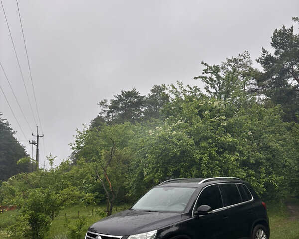 Черный Фольксваген Тигуан, объемом двигателя 1.39 л и пробегом 204 тыс. км за 9700 $, фото 2 на Automoto.ua