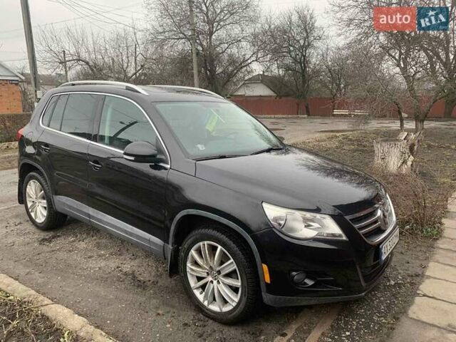 Чорний Фольксваген Тігуан, об'ємом двигуна 2 л та пробігом 199 тис. км за 10700 $, фото 7 на Automoto.ua