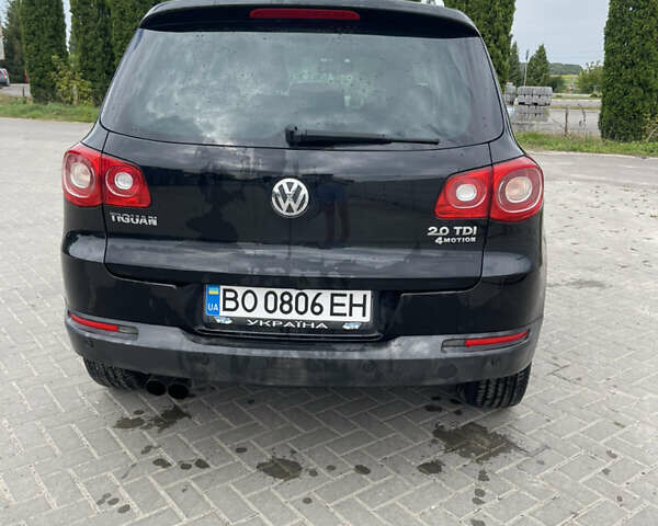 Черный Фольксваген Тигуан, объемом двигателя 1.97 л и пробегом 209 тыс. км за 12500 $, фото 7 на Automoto.ua
