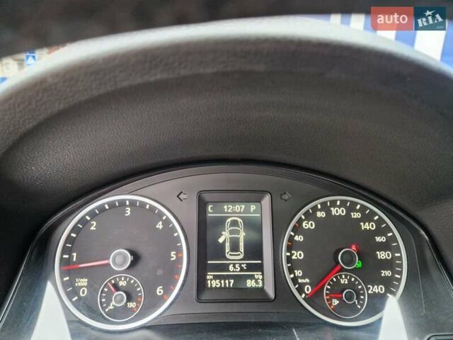 Черный Фольксваген Тигуан, объемом двигателя 2 л и пробегом 195 тыс. км за 13300 $, фото 23 на Automoto.ua