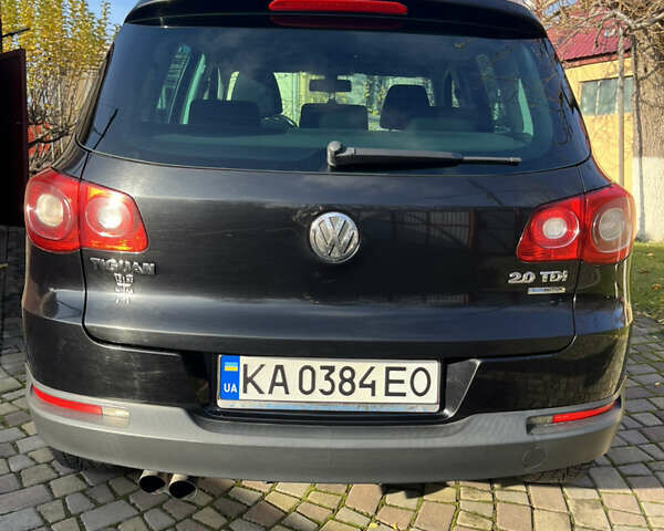 Чорний Фольксваген Тігуан, об'ємом двигуна 2 л та пробігом 170 тис. км за 13900 $, фото 5 на Automoto.ua