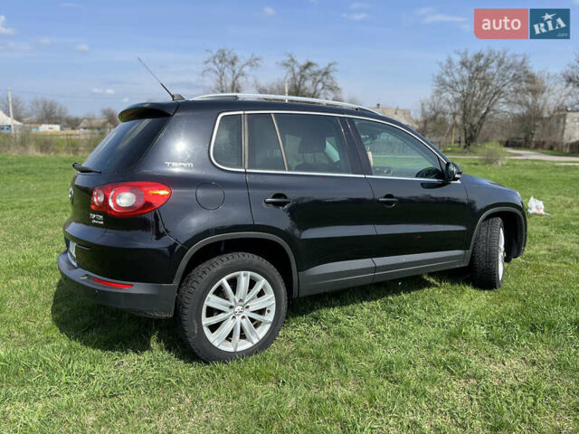 Чорний Фольксваген Тігуан, об'ємом двигуна 2 л та пробігом 260 тис. км за 13000 $, фото 1 на Automoto.ua