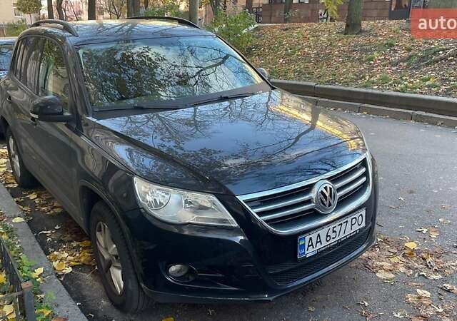 Черный Фольксваген Тигуан, объемом двигателя 2 л и пробегом 223 тыс. км за 10450 $, фото 1 на Automoto.ua