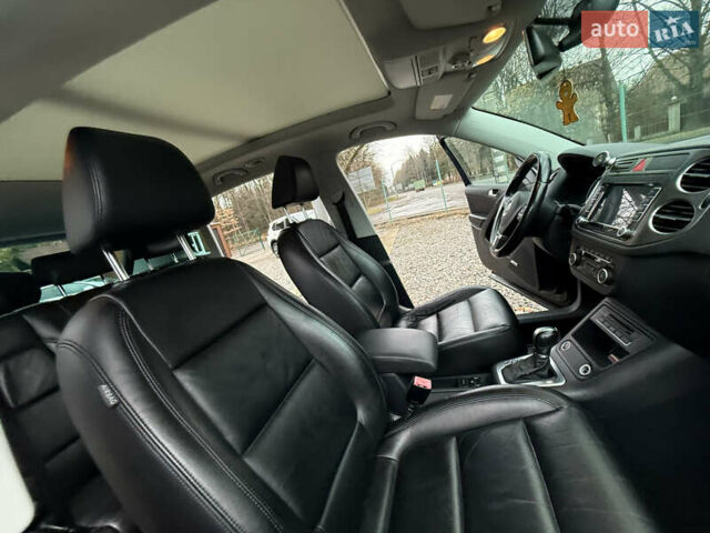Чорний Фольксваген Тігуан, об'ємом двигуна 2 л та пробігом 238 тис. км за 10599 $, фото 23 на Automoto.ua