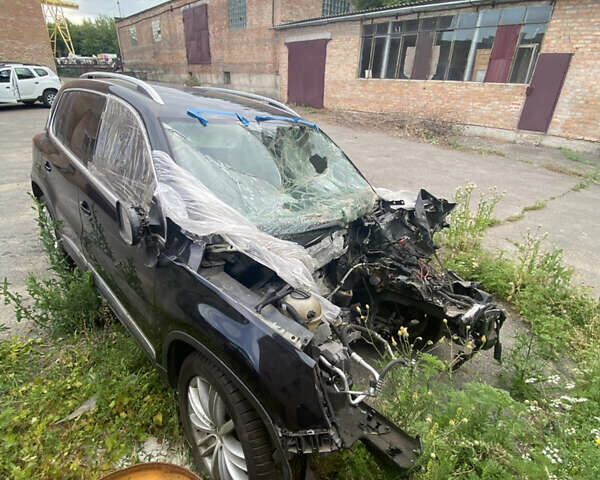 Чорний Фольксваген Тігуан, об'ємом двигуна 2 л та пробігом 270 тис. км за 2999 $, фото 3 на Automoto.ua