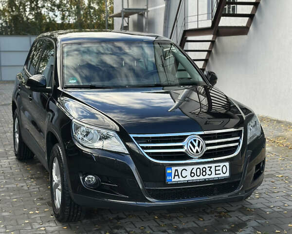Черный Фольксваген Тигуан, объемом двигателя 1.98 л и пробегом 210 тыс. км за 12000 $, фото 1 на Automoto.ua