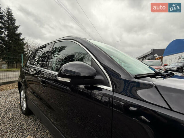 Чорний Фольксваген Тігуан, об'ємом двигуна 2 л та пробігом 238 тис. км за 10599 $, фото 50 на Automoto.ua