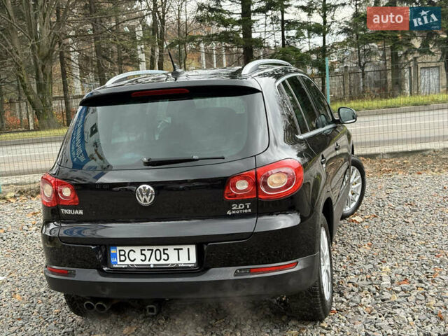 Чорний Фольксваген Тігуан, об'ємом двигуна 2 л та пробігом 238 тис. км за 10599 $, фото 66 на Automoto.ua