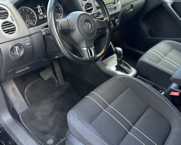 Черный Фольксваген Тигуан, объемом двигателя 1.98 л и пробегом 210 тыс. км за 12000 $, фото 12 на Automoto.ua