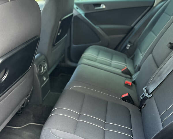 Черный Фольксваген Тигуан, объемом двигателя 1.98 л и пробегом 210 тыс. км за 12000 $, фото 14 на Automoto.ua