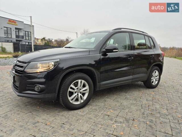 Чорний Фольксваген Тігуан, об'ємом двигуна 1.39 л та пробігом 253 тис. км за 11500 $, фото 1 на Automoto.ua